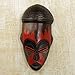 NOVICA Nigerian Red And Black Handcrafted African Rubberwood Mask With Brass Accents, 'Harvest Joy'