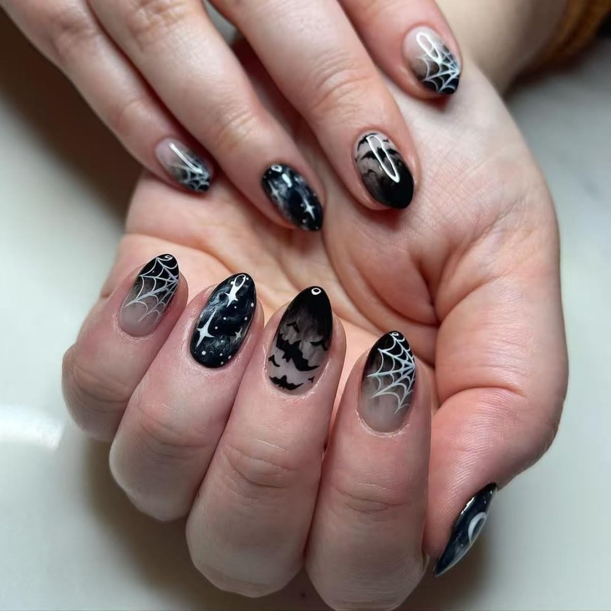Photo 1 of *Missing Parts*
Halloween Press on Nails Short Almond Fake Nails with Spider Web Bat Design Stick on Nails Black Gradient False Nails Goth Reusable Acrylic Glue On Nail for Women Nail Art Decoration 24Pcs