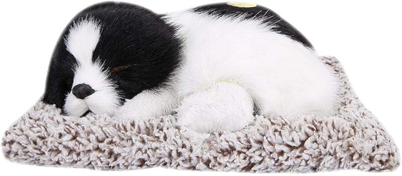 peluche perro blanco y negro