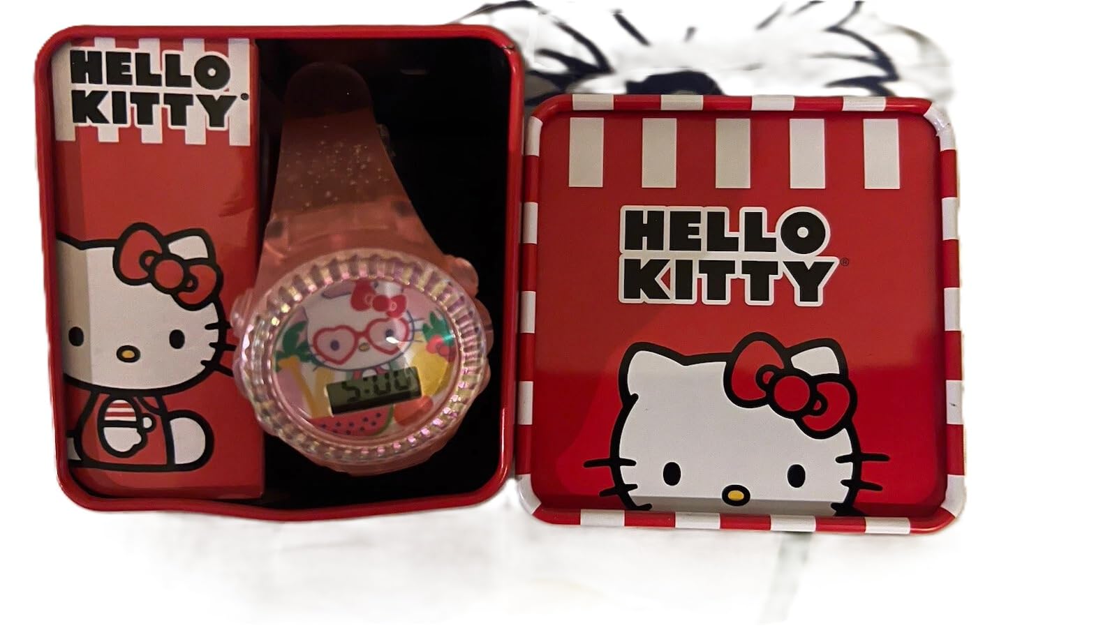 Accutime Sanrio Hello Kitty Kids LCD Watch – Pink Glitter Strap, Transparent Case, Iridescent Bezel, Digital Display, Cute Floral Printed Dial, Adjustable Fit, Perfect for Girls – Fits Wrists 5.5” to 8”