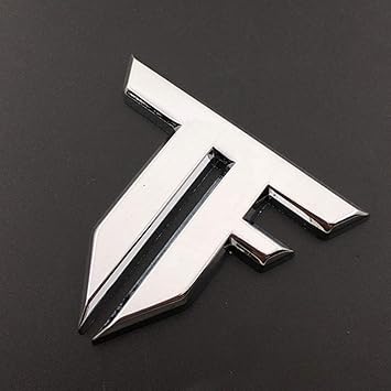 Amazon.com: UpAuto 3D TF emblema de metal adhesivo del vehículo logo trasero del maletero tapa auto insignia adhesivo: Automotive