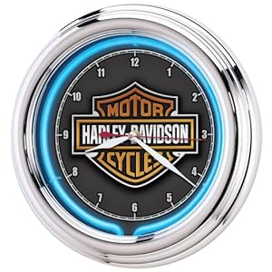 Harley-Davidson logo behind minute and hour hands