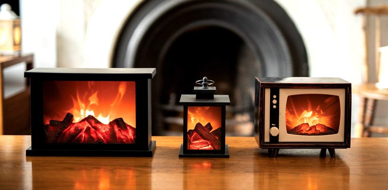 Caminetto decorativo finto a LED con effetto fuoco fiamma simulazione camino,  forma di televisore TV vintage: Amazon.it: Casa e cucina