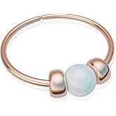 Rose gold nose piercing with 2mm opal & plain hoop