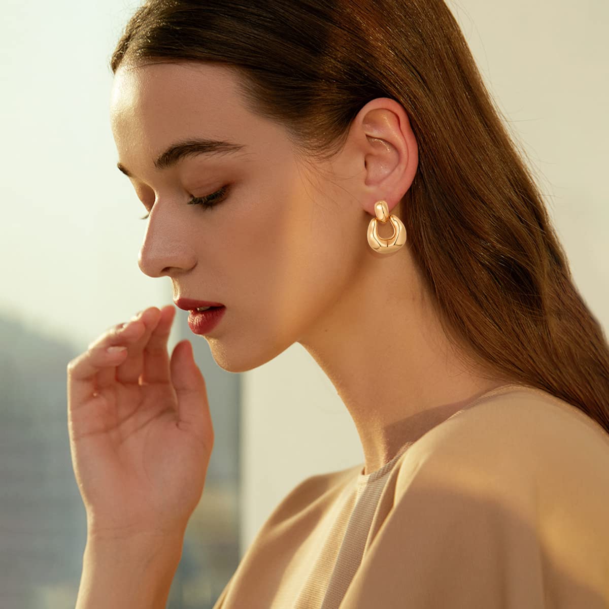 HESSAWELL Gold Dangle Earrings