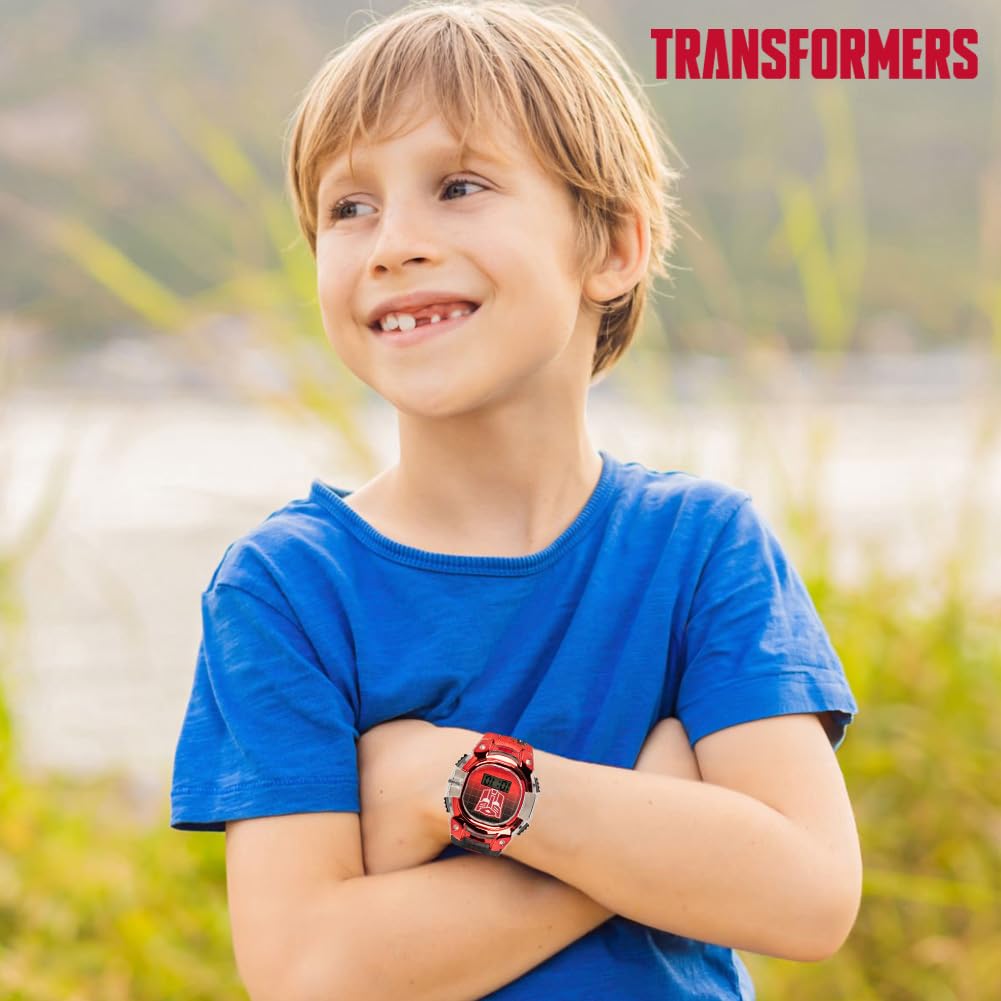 Accutime Transformers Kids Watch – LCD Display, Metallic Bezel, Adjustable Comfortable Strap, Collectible Tin – Perfect for Boys and Girls