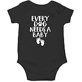 Every Dog Needs a Baby - Funny Baby Essentials Bodysuit - Baby Boy Clothes Newborn Girl Outfits