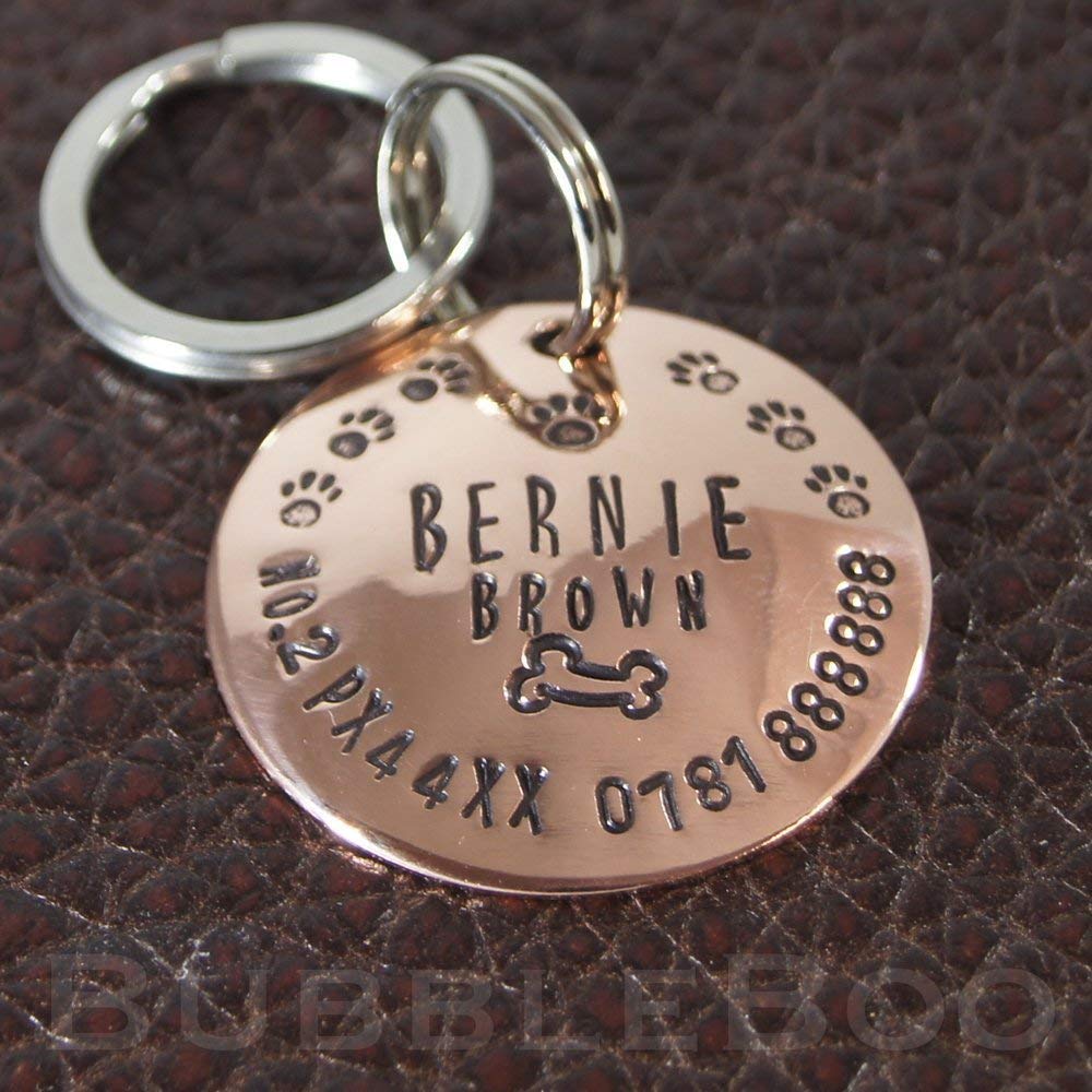 Pet Dog Name Tag. Personalised domed copper disc with bone and paw prints. ID tag. Dog Tag. Hand stamped. Puppy Tag