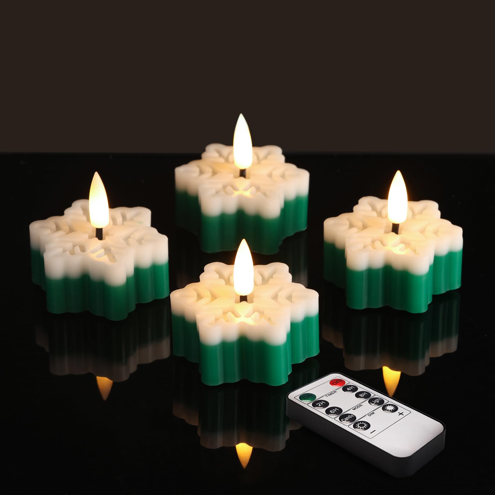 Photo 1 of ***POSSIBLY NEED BATTERIES REPLACED***Girimax Snowflakes Flameless Wax Tealights with Remote Timer, Green White Christmas LED Tea Votive Candles Battery Operated, Set of 4***POSSIBLY NEED BATTERIES REPLACED***