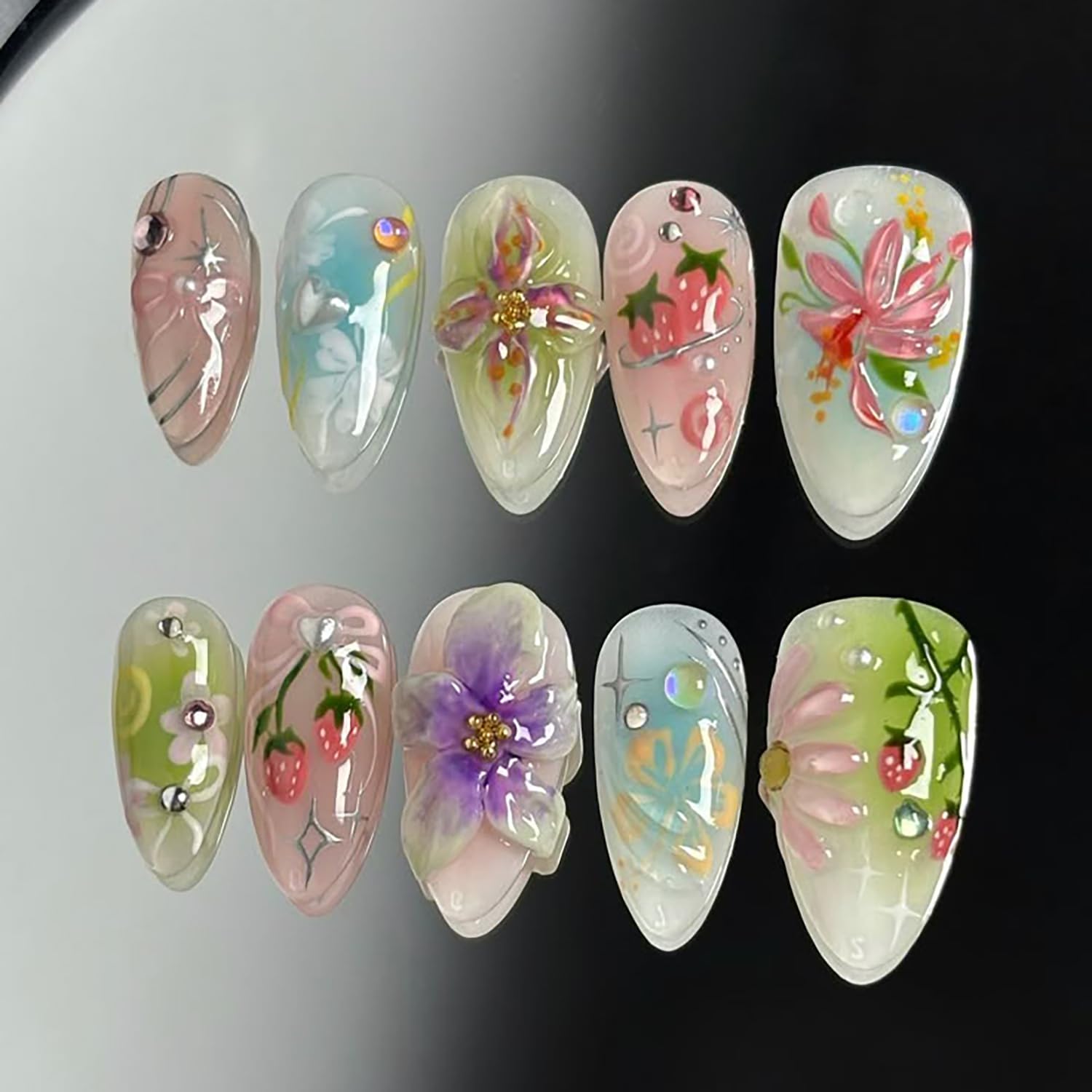 Photo 1 of 30Pcs 3D Flower Press on Nails Medium Almond Fake Nails with Pearl Rhinestones Designs Fill Cover Glue on Nails Cute Strawberry Acrylic Nails Pink Bow False Nails Star Floral Stick on Nails for Women