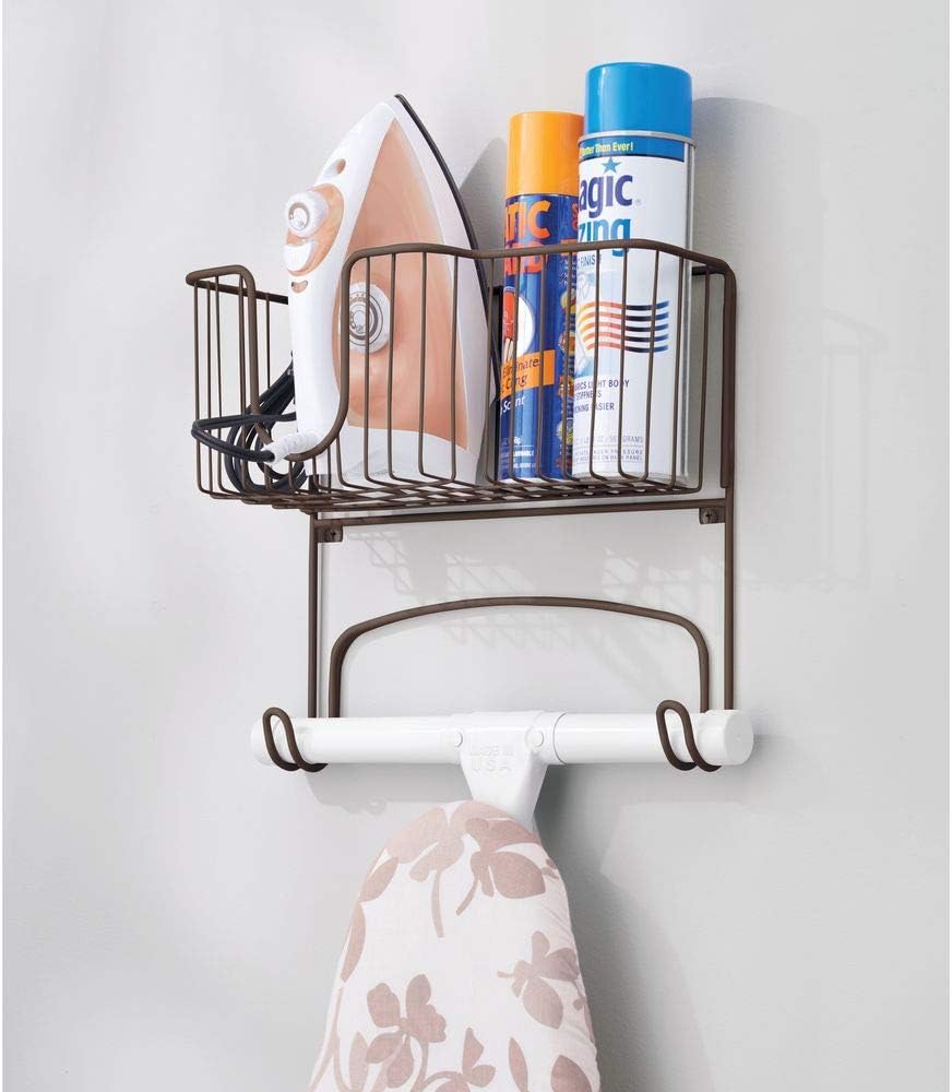 mDesign Metal Wall Mount Ironing Board Holder with Large Storage Basket - Holds Iron, Board, Spray Bottles, Starch, Fabric Refresher for Laundry Rooms - Bronze: Home & Kitchen