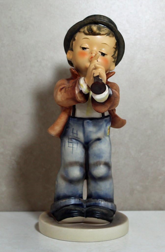 hummel boy playing flute