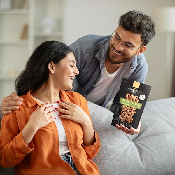 SQUIRREL BRAND CARAMEL TOASTED COLADA CASHEWS 3.5 OZ RESEALABLE BAG WITH SWEET TOASTED COCONUT, NATURAL FLAVORS