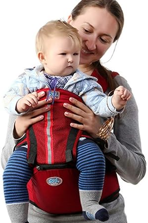baby holding backpack