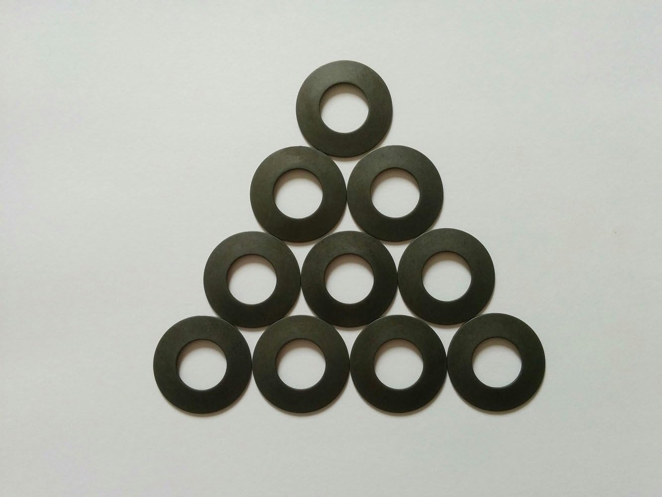 Metric Steel Belleville Spring Washer.787"(20.0mm) Outer Diameter, 0.402"(10.2mm) Inner Diameter.031"(0.8mm) Thickness, 745 Newtons Max. Load (Pack of 10)