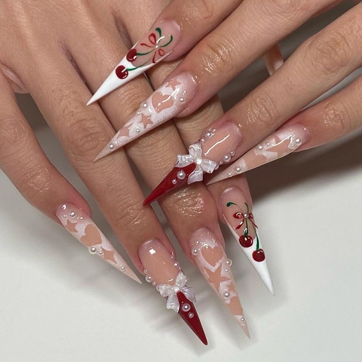 Long Press on Nails Stiletto Fake Nails Pink False Nails French Tip Acrylic Nails with 3D Bow Cherry Design Glue on Nails Heart Star Full Cover Stick on Nails for Women Manicure 24Pcs