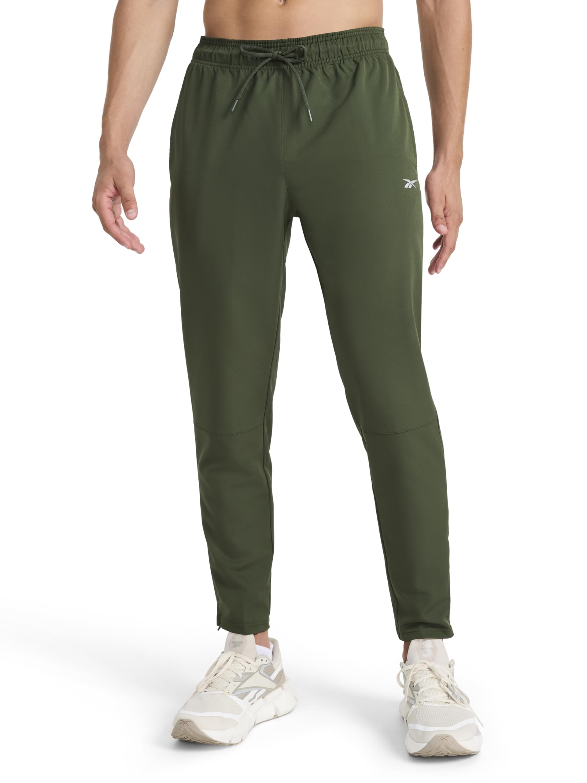Reebok Men’s Dominator Pant, Standard Fit, 30” Inseam, Lightweight Stretch Poly Fabric, Duffel Bag, Medium