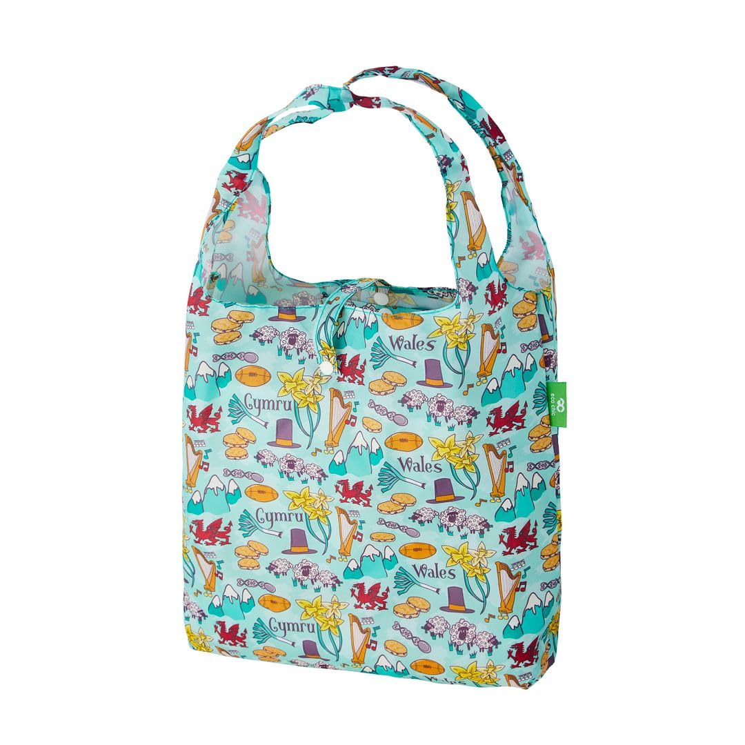 ECO CHIC Lightweight Foldable Reusable Shopping Bag | Water Resistant Shopping Tote Bag | Folds Into Attached Pouch for Storage | Made from Recycled Plastic Bottles (Wales Montage Blue), S