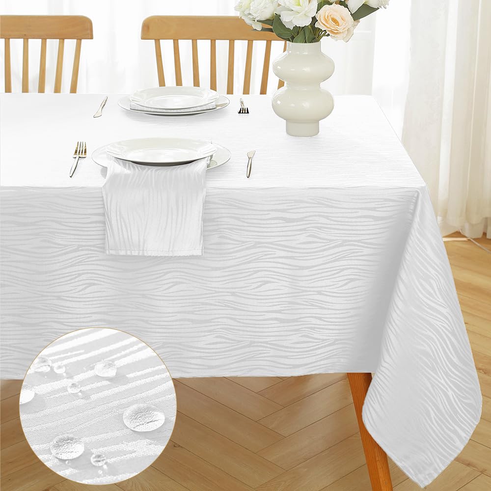 Photo 1 of MATIRUG White Rectangular Tablecloth 60x102 Inch,Waterproof Wrinkle Free Textured Jacquard Polyester Table Cloth,Washable Fabric Farmhouse Table Cover for Dinning Wedding Buffet Christmas Holiday