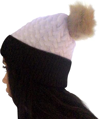 black hat with brown fur pom pom