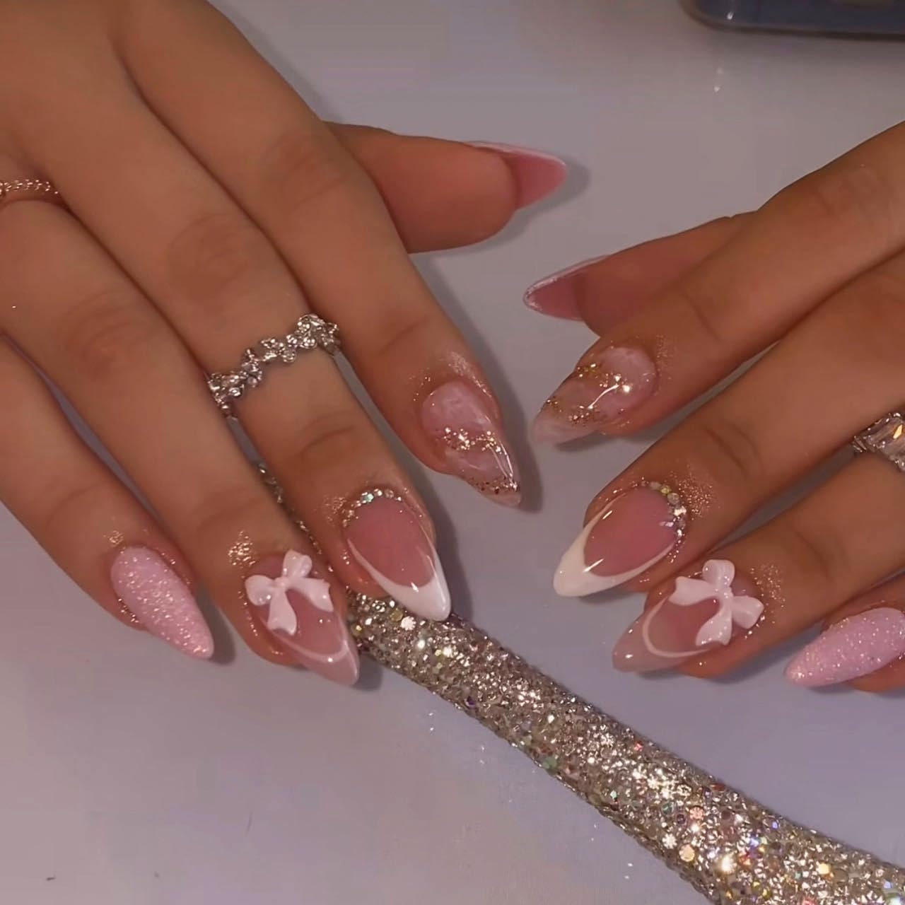 Photo 1 of ***STOCK PHOTO FOR REFERENCE ONLY***
24Pcs White French Tip Press on Nails Short Almond Valentines Day Fake Nails Glitter Stick on Nails 3D Bow Rhinestones Design Nude Nail Tips Full Cover Acrylic Valentine Decor False Nail for Women