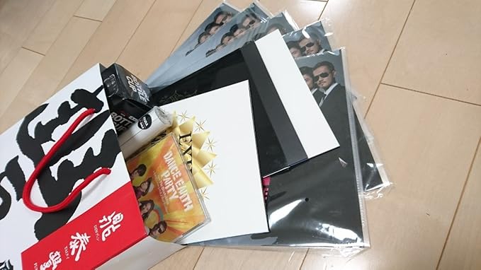 Amazon Co Jp Exile自作 グッズ セット18年 のお楽しみにファイル ポスター カード Cd等 ホビー 通販