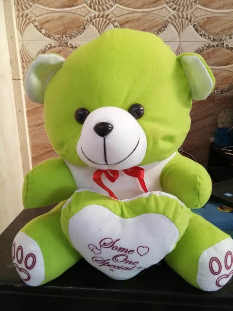 small green teddy bear