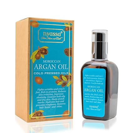 Nyassa Cold pressed Moroccan Argan Oil 100 ml. Pure Argan oil from Morocco with additional dose of Vitamin E. Good for both oily and dry skin.For healthy shiny frizz free hair; Smooth youthful skin.