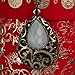 YAZILIND Vintage Bronze Hollow Teardrop White Pendant Chain Long Necklace Women 31