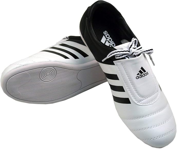 adidas white tennis shoes with black stripes
