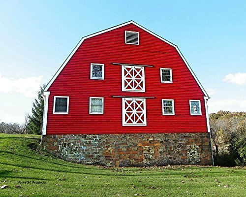 Big Red Dairy Barn. A fine art photograph of a pretty red dairy barn with a Gambrel roof. Wonderful double-X brace doors!