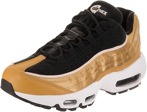 gold and black running shoes