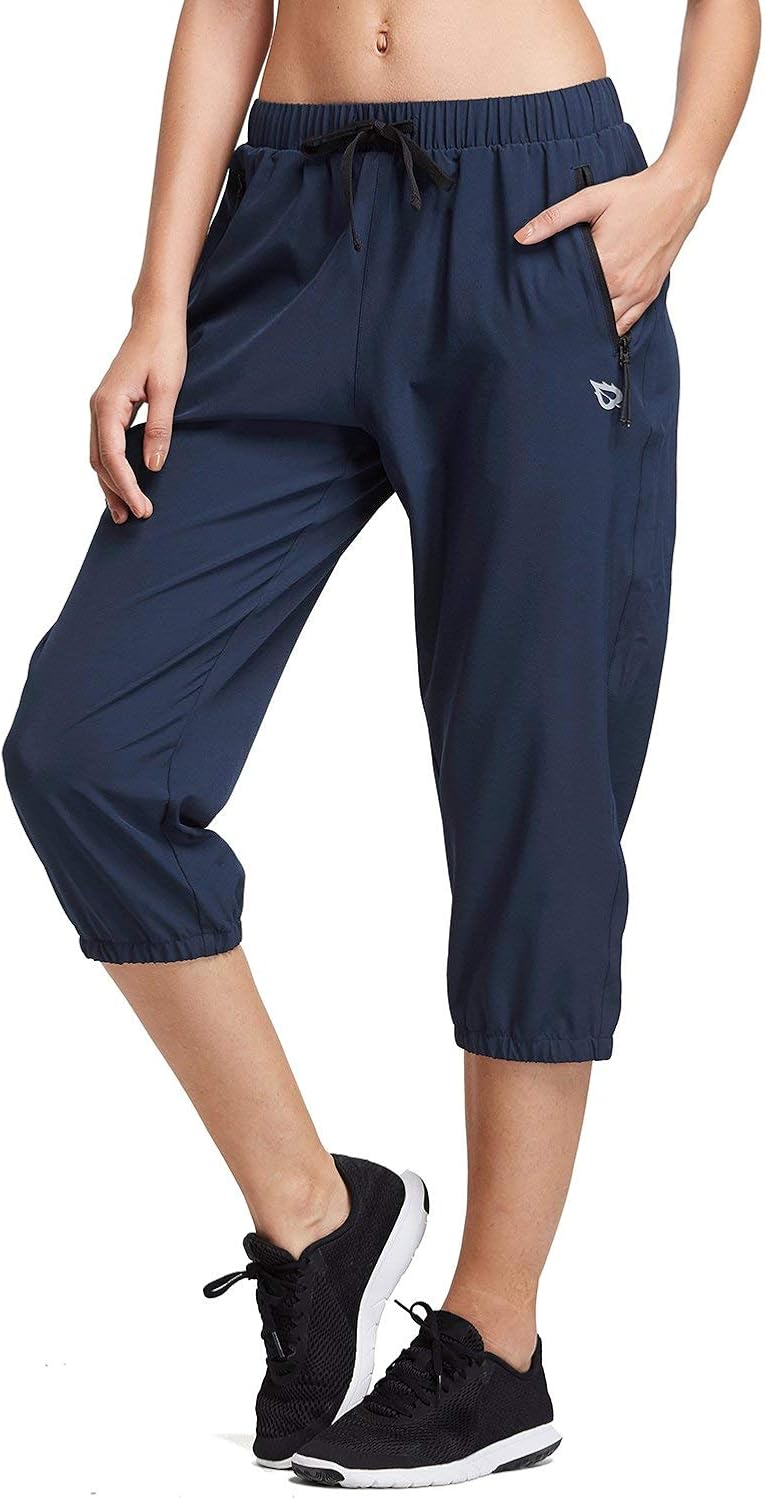 BALEAF Women Lightweight Capri Jogger Hiking Shorts Running Capri Pants Quick Dry UPF 50+ Zipper Pockets: Clothing