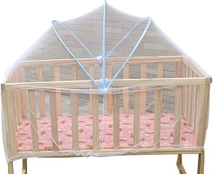 wooden cradle with mosquito net