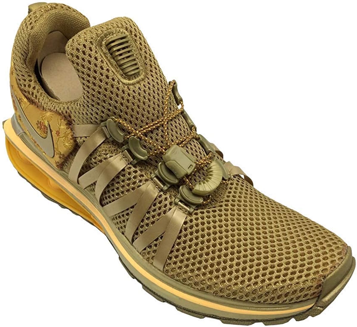 nike shox gravity women's gold