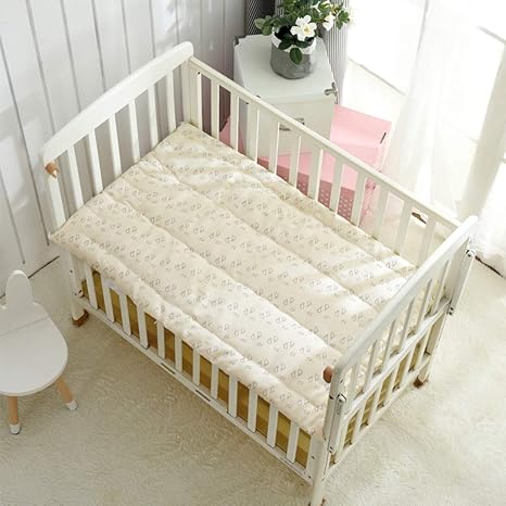 baby cot and mattress