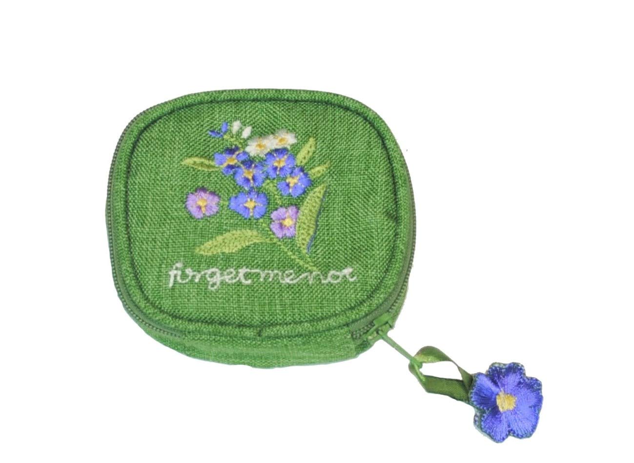 Justina Claire Pill Box Purse in a Forget-me-Not Design.