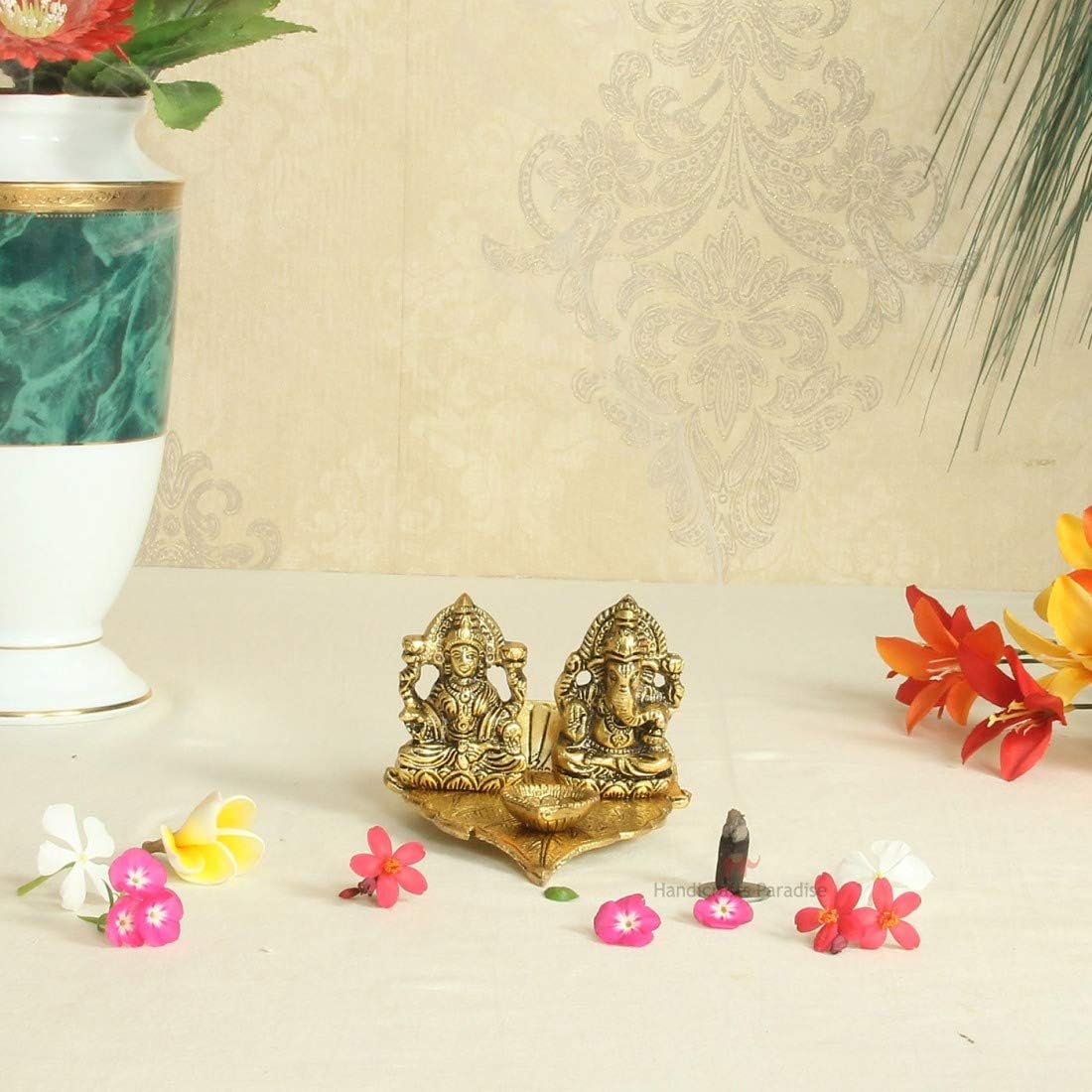 Handicrafts Paradise Metal Lakshmi Ganesh Diya On Pipal Leaf with Diya Antique Gold Plated 4 X 4 X 2.5 Inch