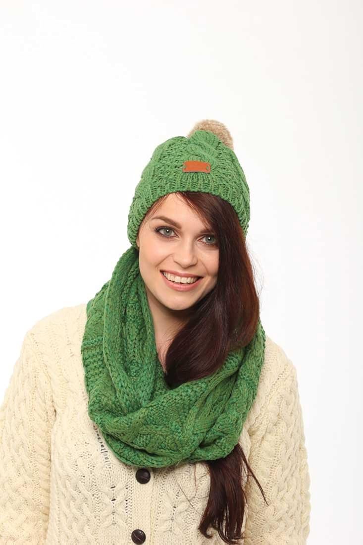 dark green bobble hat