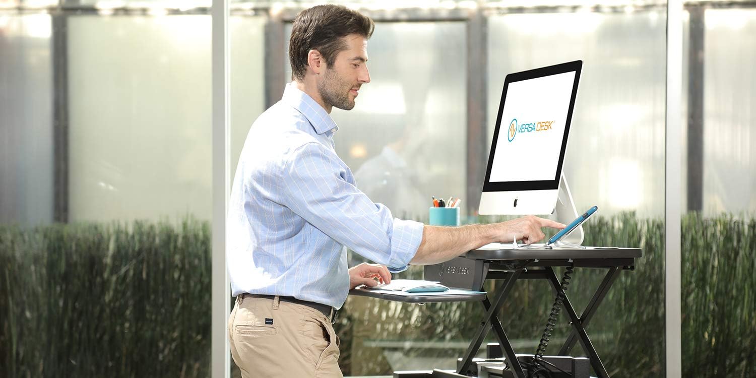 VersaDesk Power Pro USA Manufactured | Electric Height-Adjustable Desk Riser | Standing Desk Converter | Sit to Stand Desktop with Keyboard + Mouse Tray | 36" X 24" | All Black: Kitchen & Dining