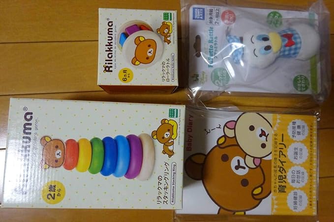 Amazon ５点セット ベビー 木製おもちゃ リラックマ 育児ダイアリー くまのがっこう ラトル スタッキングリング 鈴 赤ちゃん 幼児の おもちゃ おもちゃ