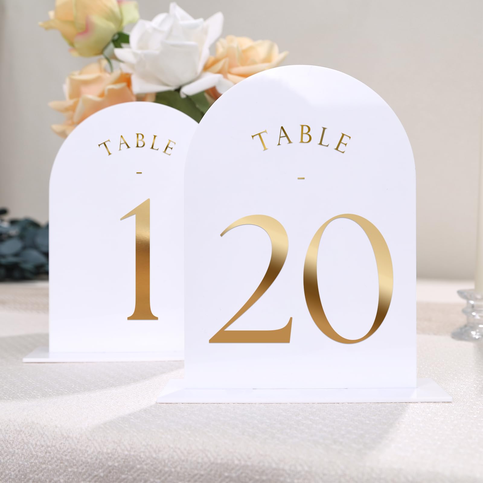 Photo 1 of UNIQOOO White Arch Wedding Table Numbers with Stands 1-20, Gold Foil Printed 5x7 Double sided Acrylic Signs and Holders, Perfect for Centerpiece, Reception, Decoration, Party, Anniversary, Event