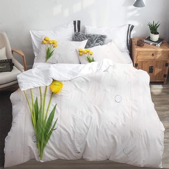 695 Juego de ropa de cama con tulipanes coloridos sobre una tabla