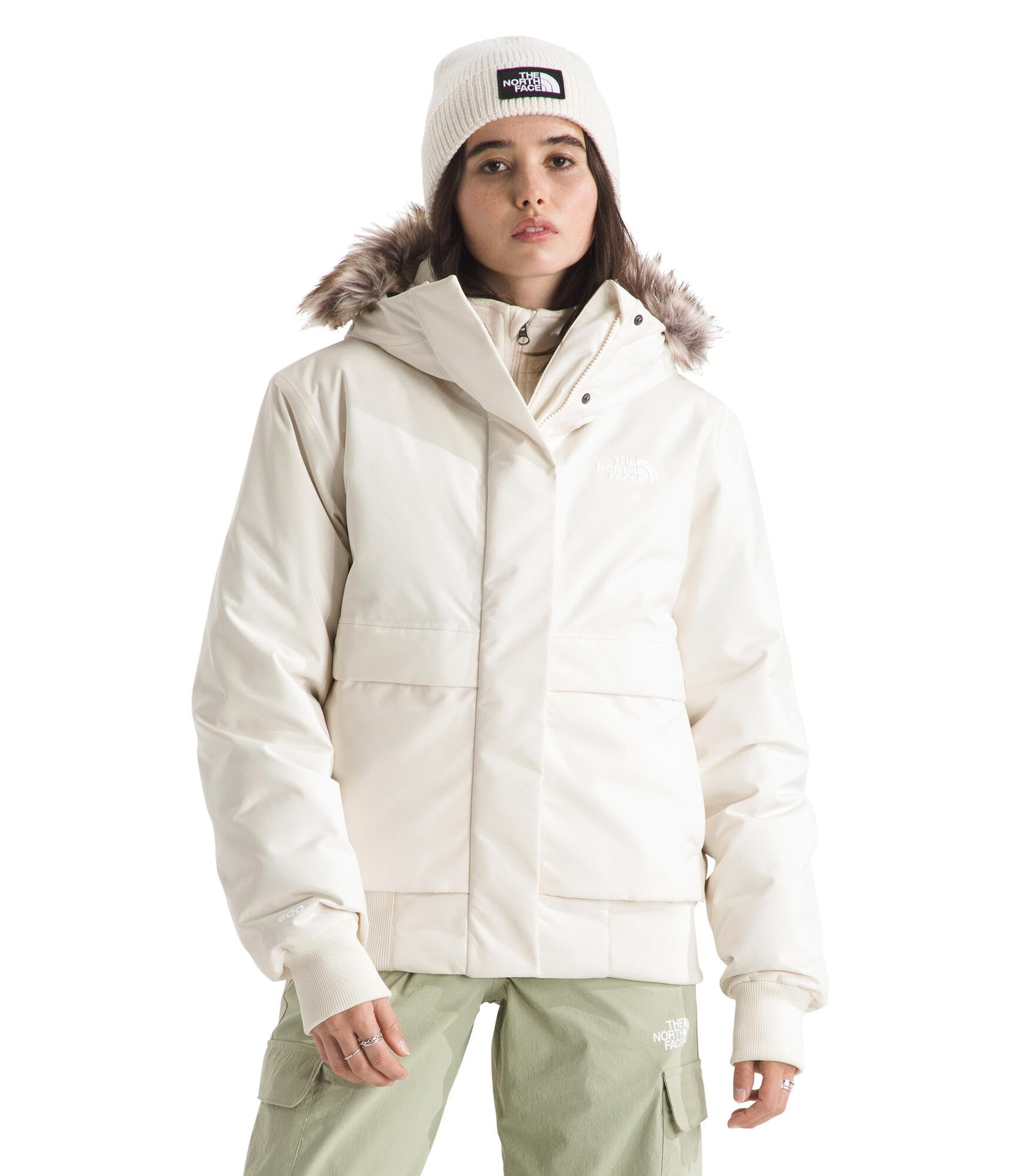 Photo 1 of The North Face Women's Arctic Bomber | Down Insulated Jacket, Waterproof Shell, Adjustable Hood with Faux-Fur Lined Trim, Dual-Entry Pockets, White Dune, X-Small