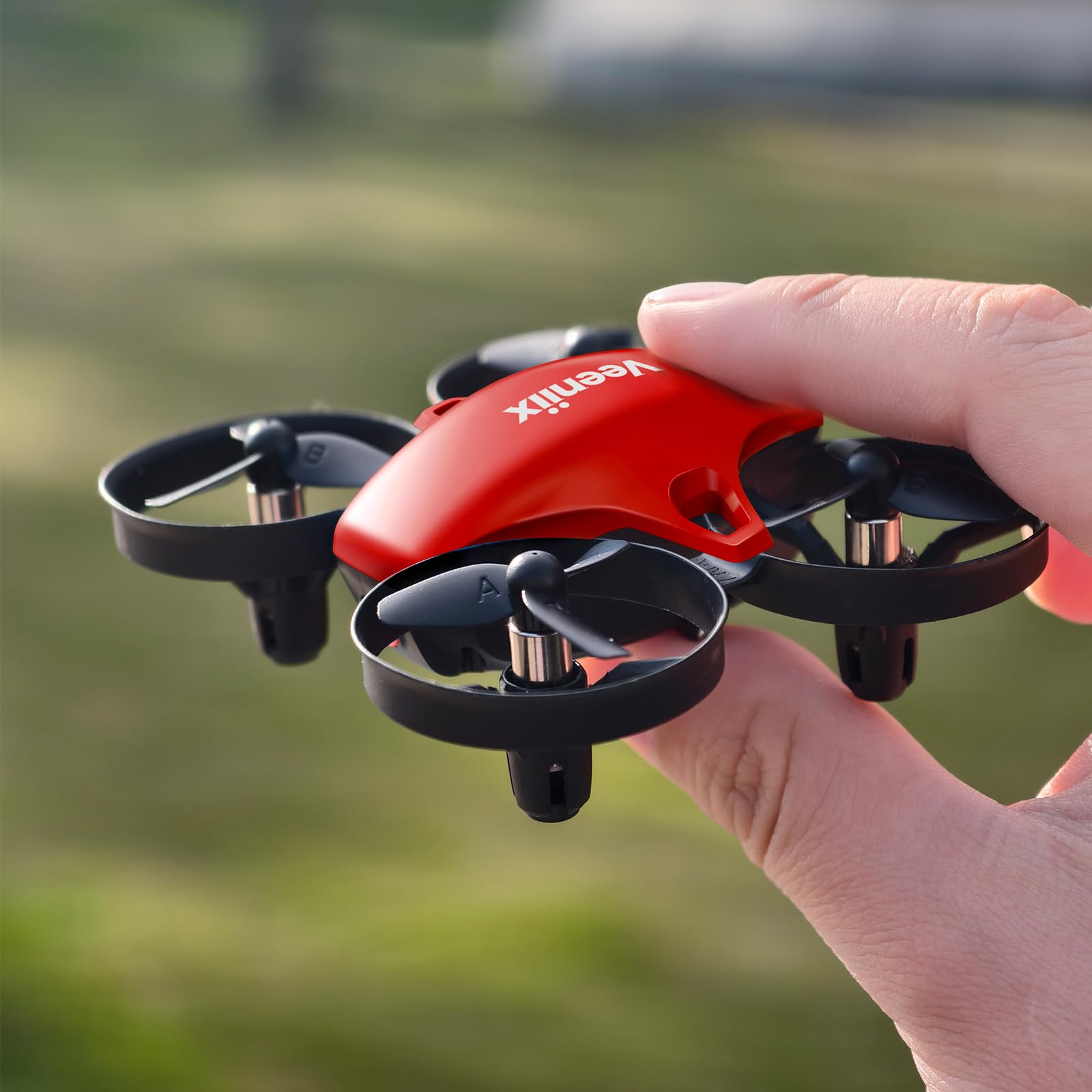 Photo 1 of Veeniix V995 Red Mini Drone for Kids and Beginners,Indoor RC Quadcopter Plane with 3D Flips, 360° Rotation, Circle Fly, Auto Hover, Headless Mode, 21Mins 3 Batteries, Gift for Boys and Girls