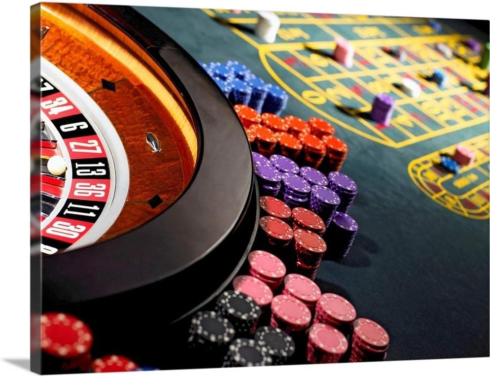 GREATBIGCANVAS Gambling Chips Stacked Around Roulette Wheel on Gaming Table Canvas Wall Art Print, 36"x27"x1.5"