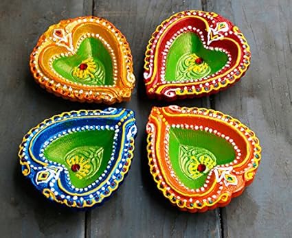 Image result for decorative diyas,nari
