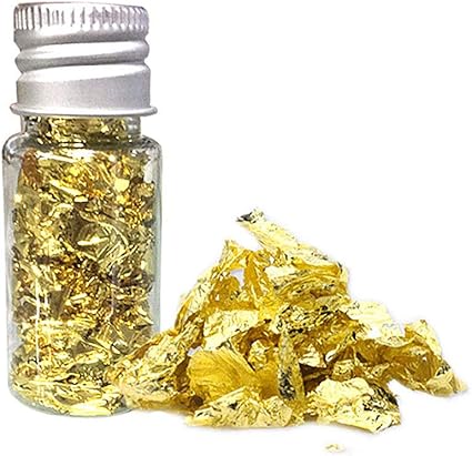 Surenhap 10 Ml Scaglie D Oro Commestibili Ornamento Di Maschera Commestibile A Foglia D Oro Decorazione Di Una Torta Al Cioccolato Con Foglie D Oro Amazon It Casa E Cucina