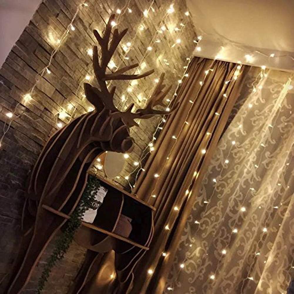Twinkle Star 300 LED Window Curtain String Light Wedding Party Home Garden Bedroom Outdoor Indoor Wall Decorations, Warm White: Home & Kitchen