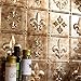 FASÄDE Fleur de Lis Decorative Vinyl Backsplash Panel in Bermuda Bronze (One 18